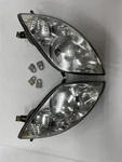 2002-2008 Arctic T660, Sabercat, Firecat Headlamps Part # 0609-530, 0609-531. Fixed Price $40.00.